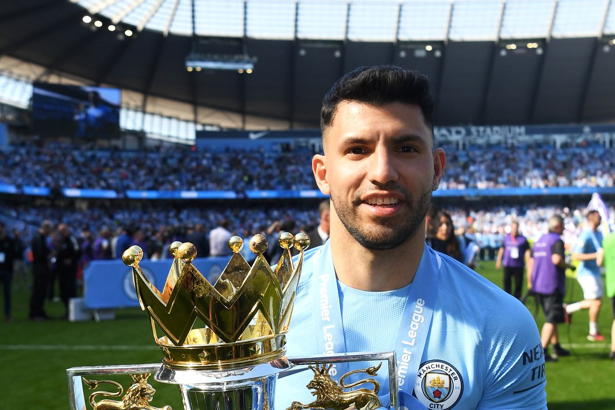 Aguero with multiple trophies